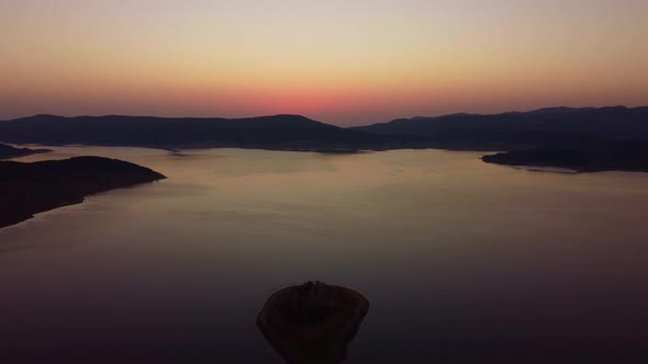 Aerial Panoramic View of Island on a Batak Reservoir in Sunrise Rhodopa Mountains Bulgaria alt