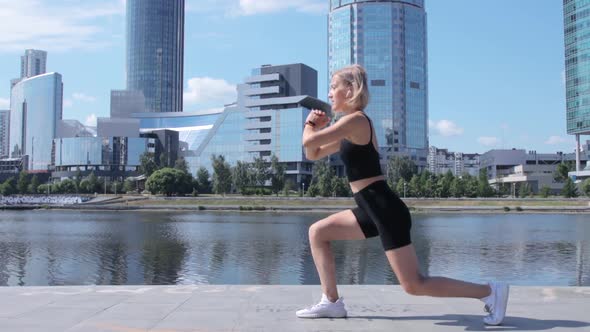 Woman working out in city