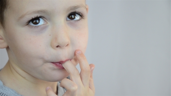 Child Eating White Chocolate 02