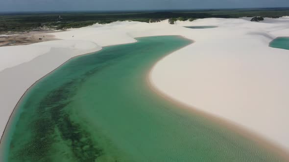 Sand dunes mountains and rain water lagoons at northeast brazilian paradise. alt