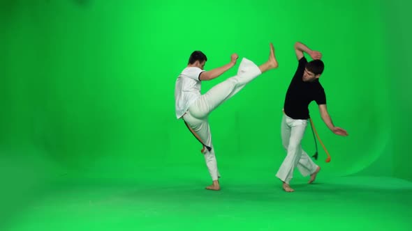 Two Man Are Practicing Capoeira on Chroma Key. Slow Motion. alt