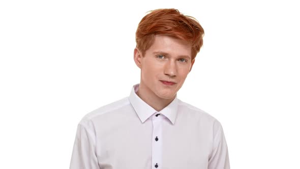 Confident Young Handsome Ginger Caucasian Young Man Pointing on Camera on White Background and alt