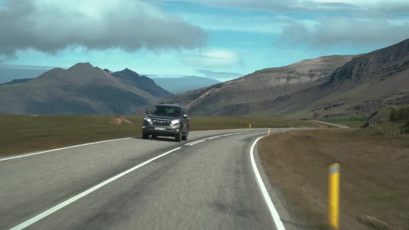Car Driving on the Road To Iceland alt