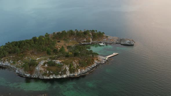Drone flying over small private island in Norway, drone stock footage by DroneRune