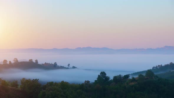 4K : Colorful sunrise over mountains tops in thailand alt