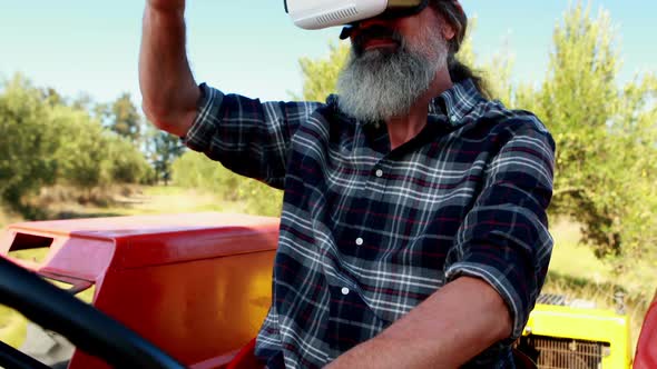 Man using virtual reality headset in tractor 4k alt