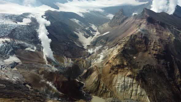 active volcano with glacier in smoke