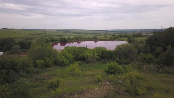 Picturesque Aerial Landscape with Unusual Pink Lake, Colored Water By Algae