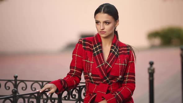 Glamourous Woman in Trendy Red Coat