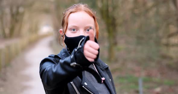 Beautiful Young Girl or Woman Wears Face Mask to Protect From Coronavirus Outbreak Second Wave of alt