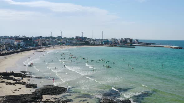 People who enjoy the clear blue sea and surfing, Jeju Island alt