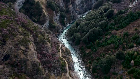 Aerial cinematic reveal of Skippers canyon and Shotover River in Queenstown, Central Otago, New Zeal alt
