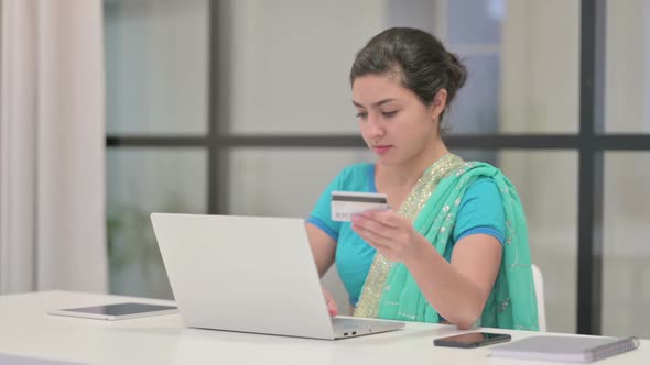 Indian Woman Making Successful Online Payment on Laptop alt