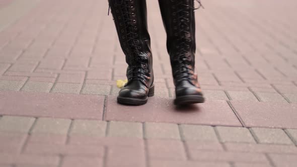 Following Young Woman Enjoying Day Spinning and Dancing and Walking the City Streets alt