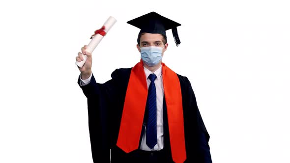 Graduating Student In Protective Mask Walking During Covid 19