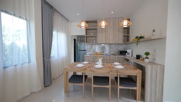Minimal and Stylish Decorative Dining Area With Wooden Table and Chairs alt