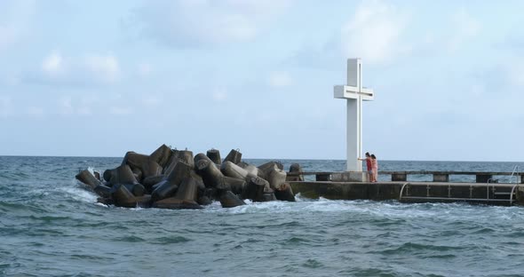 Cross Memorial on Summer Beach alt