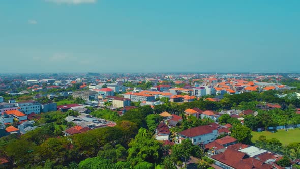 Aerial Flight Over The Roofs Of Houses And Hotels In Bali alt