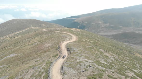 Pickup Truck Riding on Mountain Road