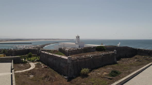 Orbiting around historical Peniche fortress Portuguese coastline