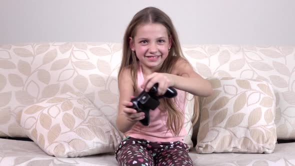 Child Playing Video Game on Tv in Morning, Slowmotion alt