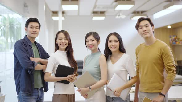 Portrait of creative business team. Hipster Creative Startup Young business people in modern office alt