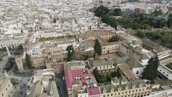 Circular aerial view of "Archivo General de Indias" surrounded by the city.  Seville. Spain