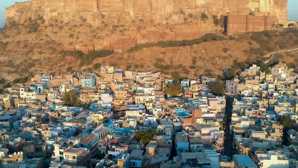 Sunrise fly over of densely populated, Blue city of Jodhpur, Rajasthan, India alt