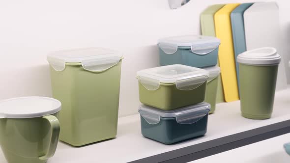 Different Colors of Plastic Tableware Boxes Plates and Glasses
