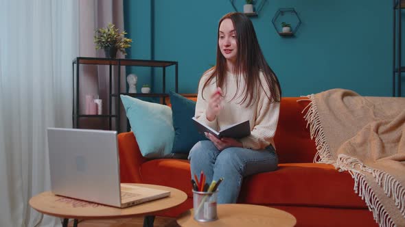 Young Woman Teacher Freelancer Consult Student By Laptop Use Modern Tech for Elearning at Home Room alt