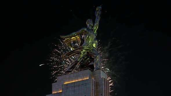 fireworks and soviet monument Rabochiy i Kolkhoznitsa, Moscow, Russia.Made of in 1937