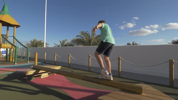 Child Having Fun at Outdoor Playground alt