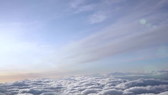 Flying Above Sunny Clouds