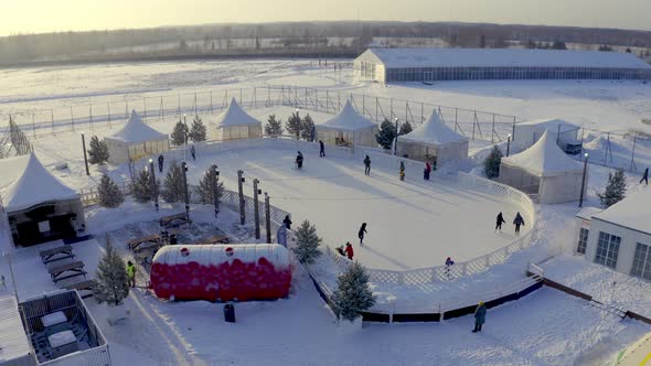 Aerial View of People Skating on an Outdoor Skating Rink in Winter Winter Fun on Ice