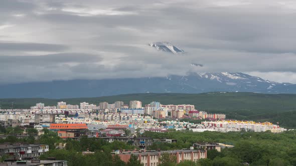 Time Lapse of Petropavlovsk-Kamchatsky City on Background of Active Volcano