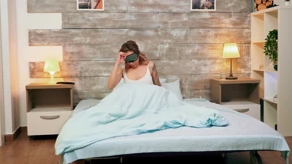 Beautiful Woman Pajamas Waking Up After a Nightmare alt