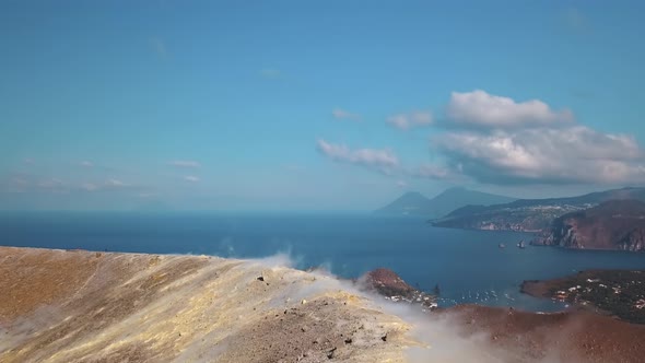 Aerial View on Volcanic Gas Exiting Through Fumaroles. Steaming Volcano Surface. Vulcano, Lipari alt