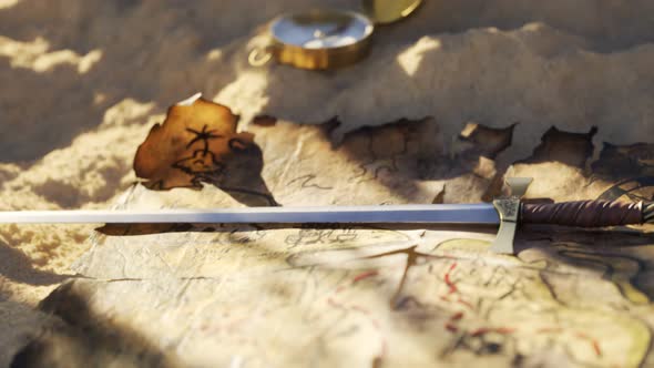 Old, worn handmade treasure map on tropical beach sand near the dig site. 4KHD alt