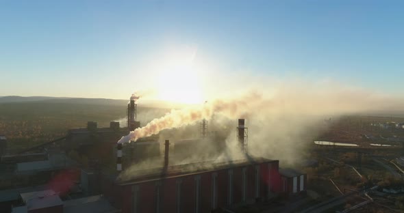 Aerial Drone Footage of Steel Factory Chimneys During Sunset Time Aerial 4K alt