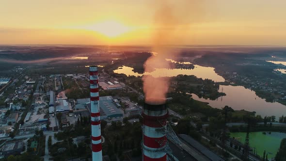 Aerial Drone Footage. Coal Fire Power Station at Sunset. alt