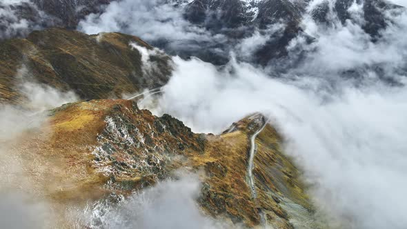 Aerial drone view of nature in Romania. Transfagarasan route in Carpathian mountains alt
