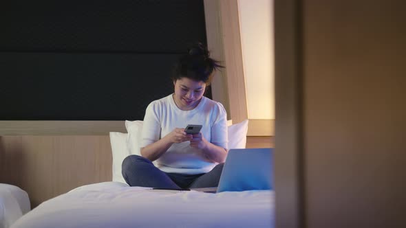 asian female Woman casual cloth working with laptop on hotel