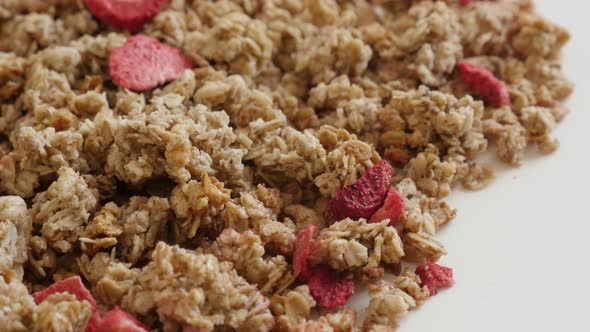 Muesli breakfast with strawberry flavor close-up 4K 2160p 30fps UltraHD footage - Morning meal with  alt