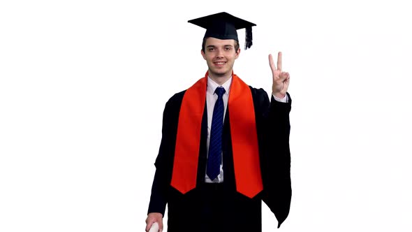 Cheerful Smiling Graduate Student Walking And Showing V Sign