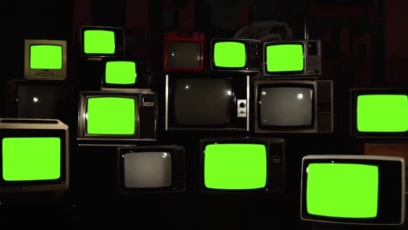 Stacked Retro TVs turning On Green Screens with Static Noise., Stock ...