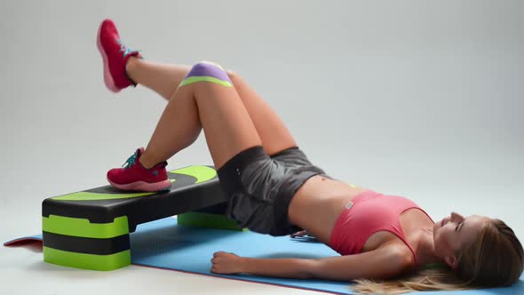 Kinesio Tape on the Girl's Knee alt