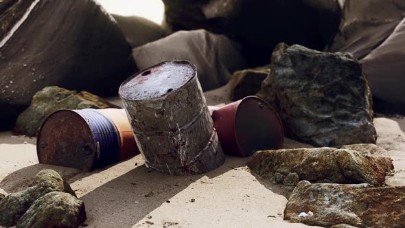 Old Oil Barrell on the Sand Beach alt