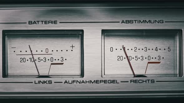 Two Analog VU Meters on Silver Colored Tape Recorder Arrow Indicators alt