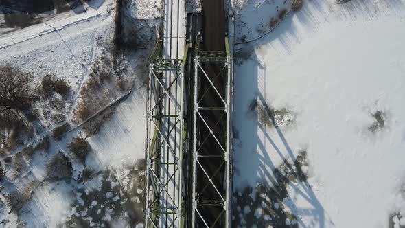 Winter bridge aerial view alt