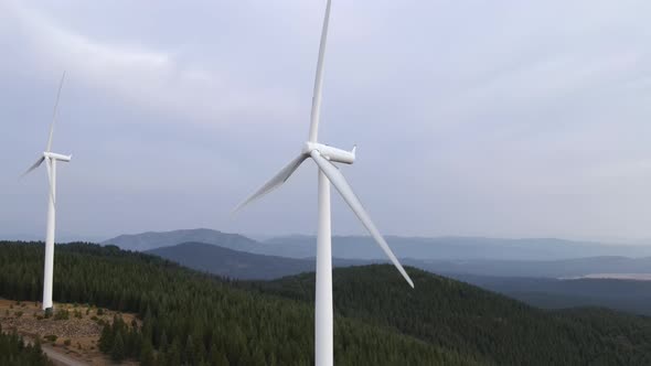 Aerial shot of a wind farm alt